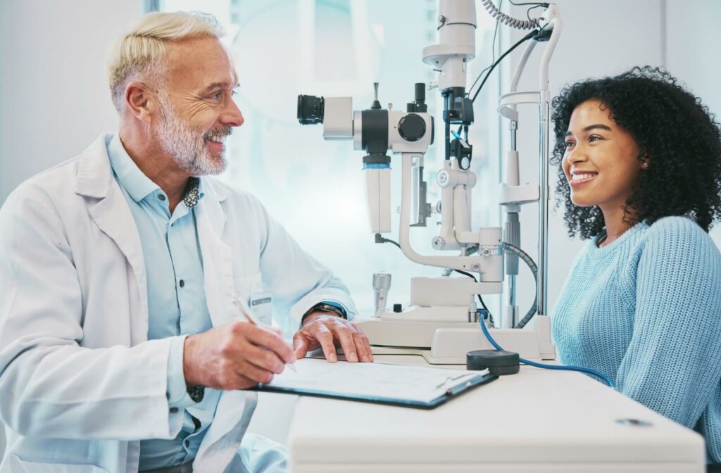 Woman speaking with an optometrist during a consultation about dry eye treatment options.